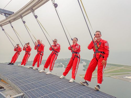 2023 — CN Tower Edgewalk. Left to right: Mohit Juneja, Deepali Vasisht, John Sabo, Dr. F. Haider Alvi, Annie Kwok, and Jim Hadjiyianni